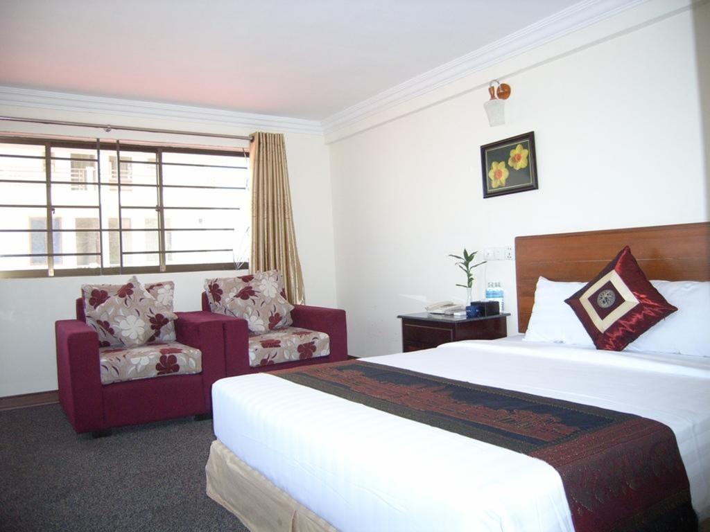 Macau Phnom Penh Hotel Habitación foto