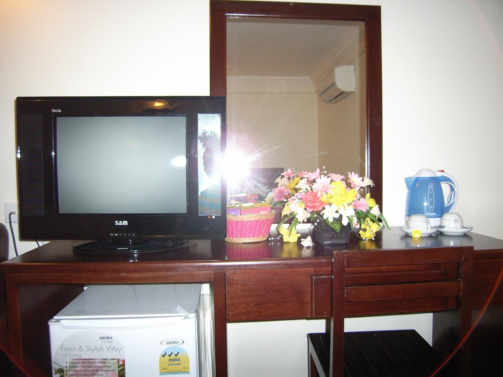 Macau Phnom Penh Hotel Habitación foto
