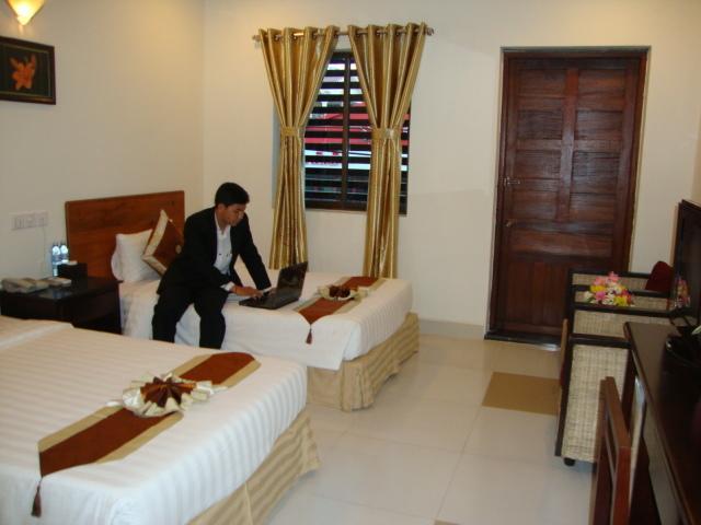 Macau Phnom Penh Hotel Habitación foto