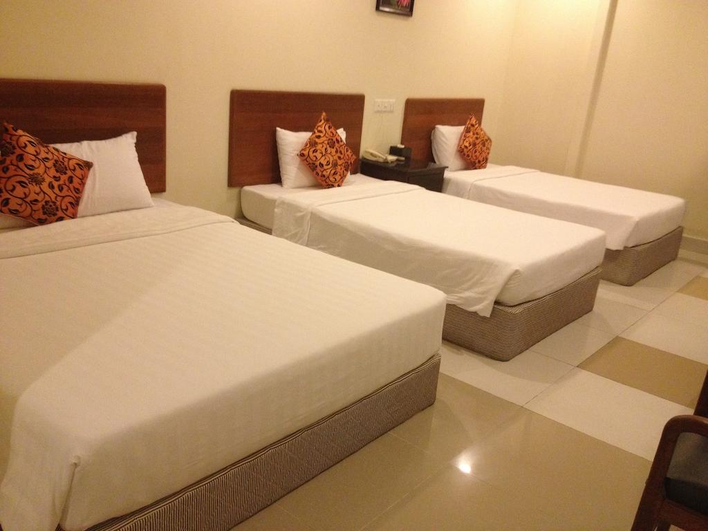 Macau Phnom Penh Hotel Habitación foto