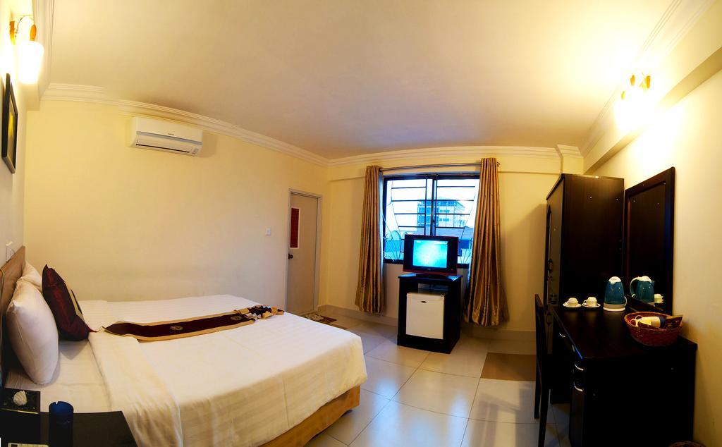 Macau Phnom Penh Hotel Habitación foto