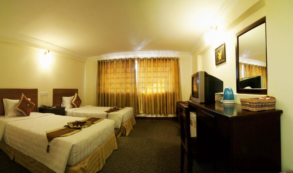 Macau Phnom Penh Hotel Habitación foto